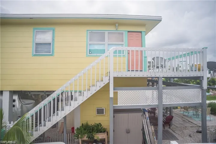 View of home's exterior with a patio prior to Hurricane Helene