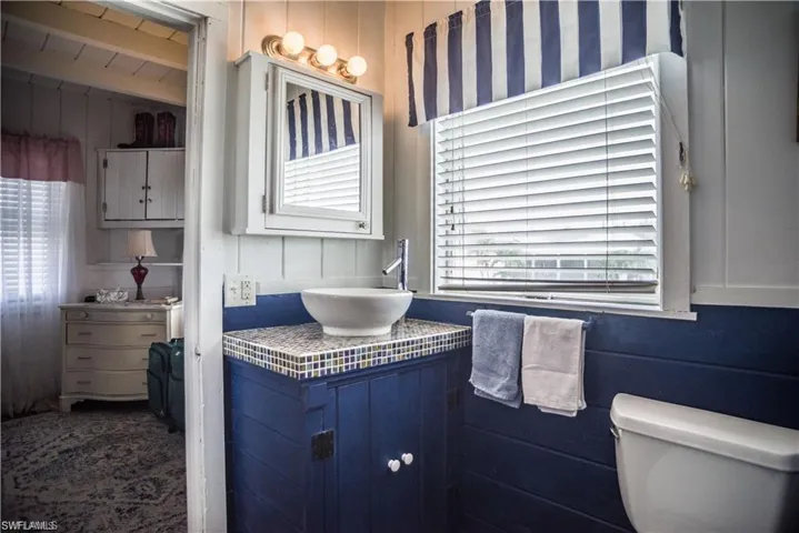 Bathroom prior to Hurricane Helene   featuring vanity and toilet