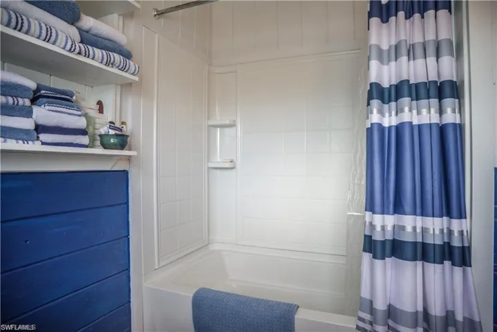 Bathroom prior to Hurricane Helene featuring   shower / tub combo