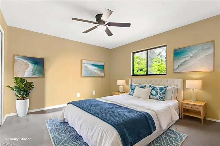 Bedroom with baseboards and ceiling fan
