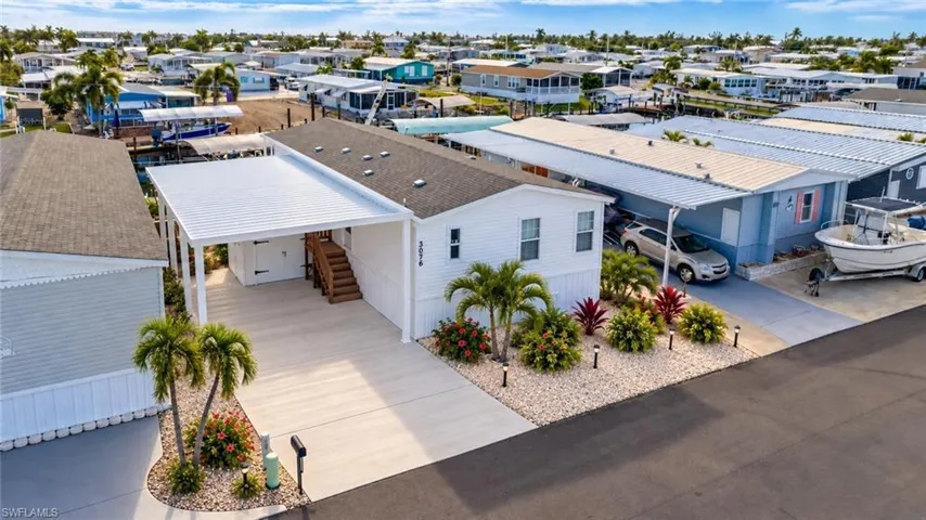 Virtually Staged with Carport and Landscaping