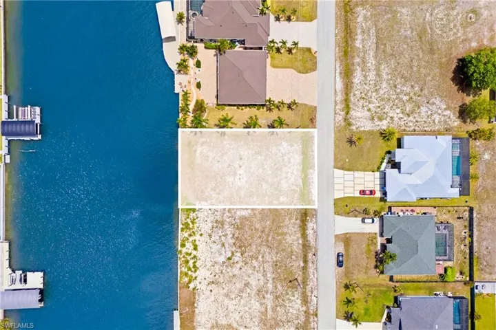 Vacant lot with water frontage, offering direct water access
