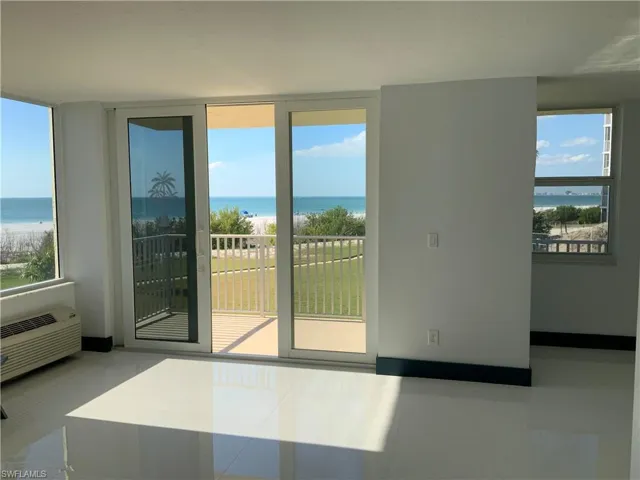 From front door walking into the condo! Watch the north end of Island light up at night ! Sanibel Island too!