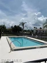 Community pool with a patio area