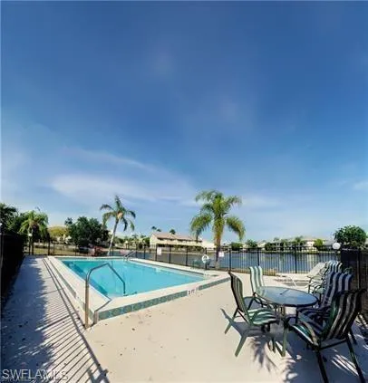 Community pool featuring a patio area