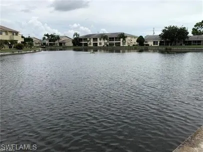 Water view with nearby suburban area