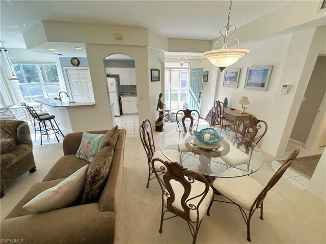 Dining room featuring light tile patterned floors