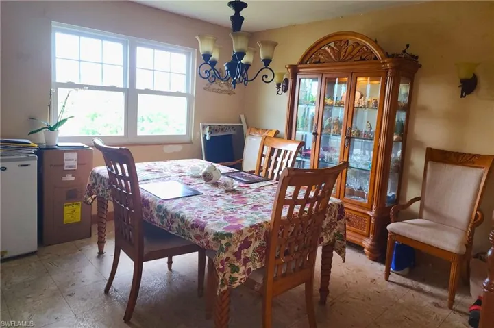 Dining space with a chandelier