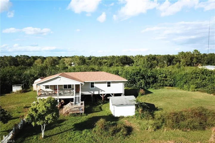 View from above of property featuring a forest