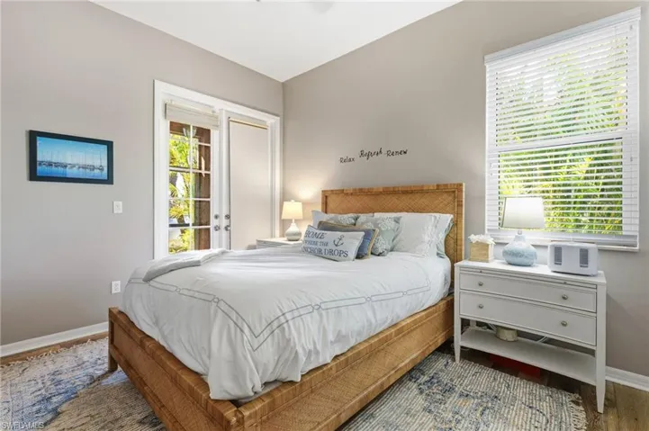 The second bedroom opens to its own screened-in lanai, offering a peaceful setting to enjoy morning coffee while taking in relaxing lake views and observing local wildlife.