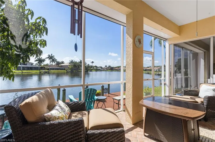 The screened-in lanai showcases the most beautiful views of the lake, perfectly positioned on its widest stretch—basically front-row seating to nature’s best show.
