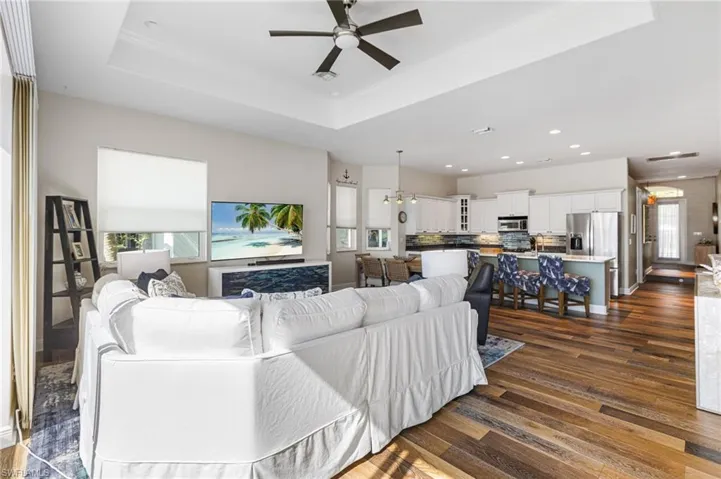 The open-concept layout flows effortlessly—perfect for hosting anything from an intimate get-together to a full house that somehow keeps inviting more people.