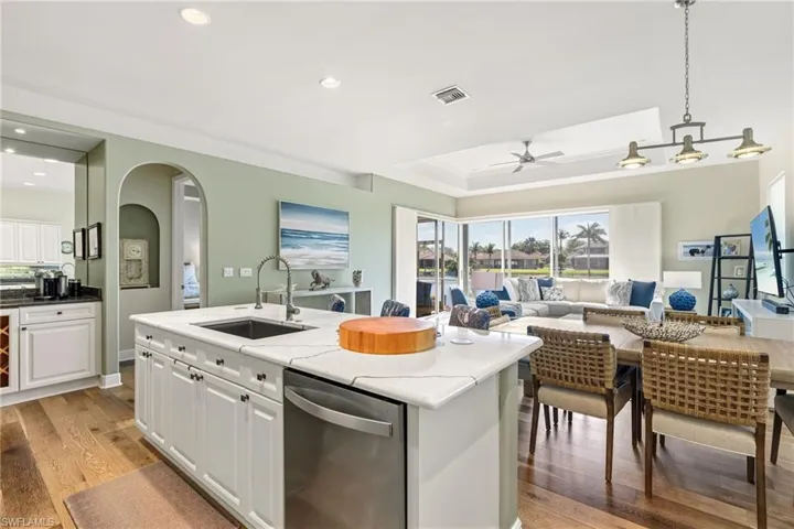 Awe-inspiring views steal the show from your remodeled chef’s kitchen—where soaring ceilings, elegant arched doorways, and luxury vinyl flooring run throughout… basically making every other kitchen a little jealous.