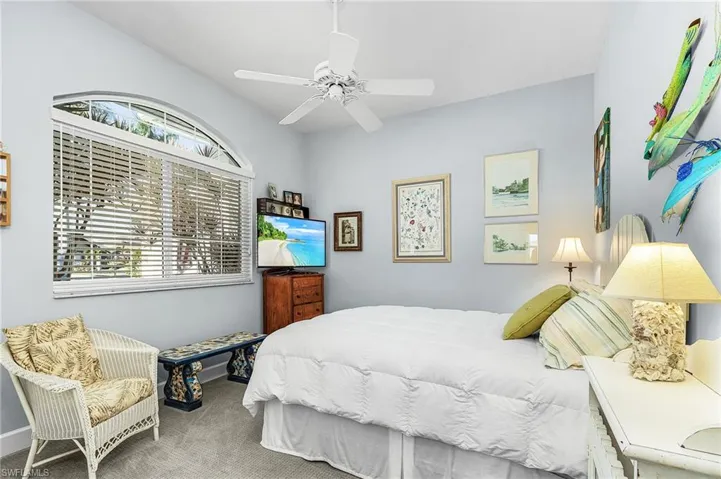 Bedroom featuring carpet flooring and a ceiling fan