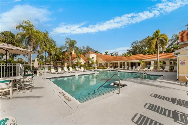 Community pool featuring a patio area