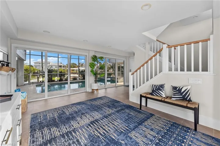 Entry foyer overlooking pool area.