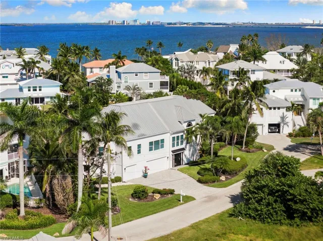 Aerial view of residential area with a large body of water