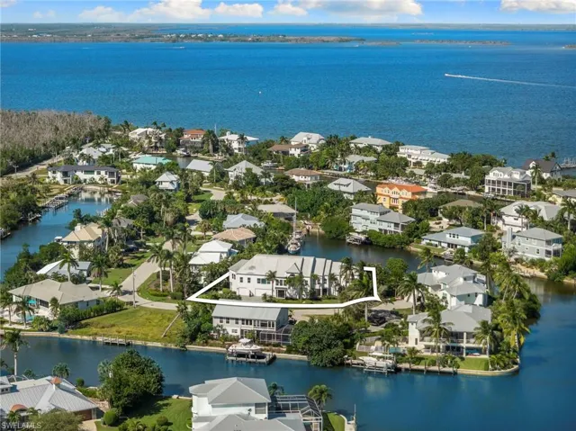 Aerial view of residential area with a nearby body of water