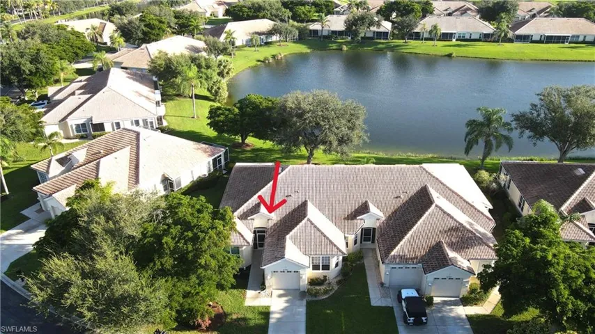 Aerial view of residential area with a nearby body of water