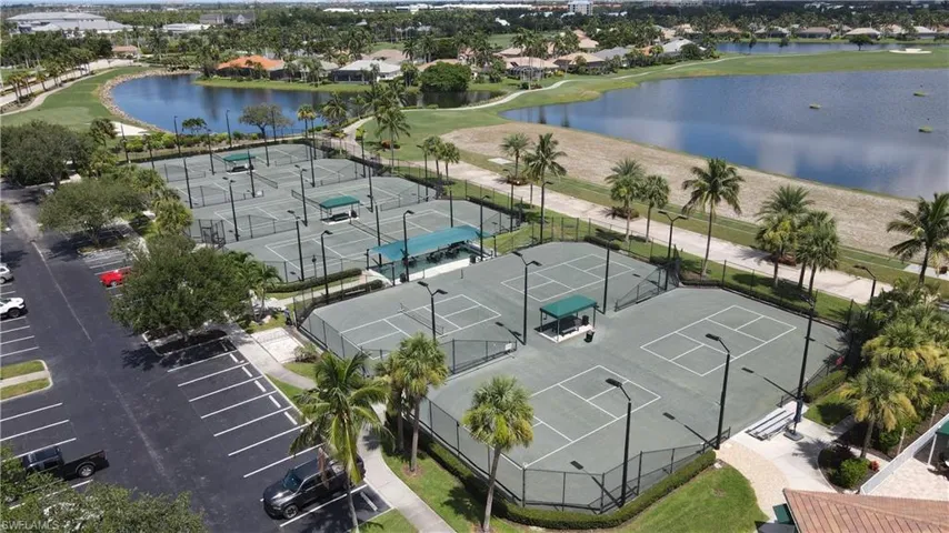 Aerial view of driving range, tennis courts, and pickleball courts