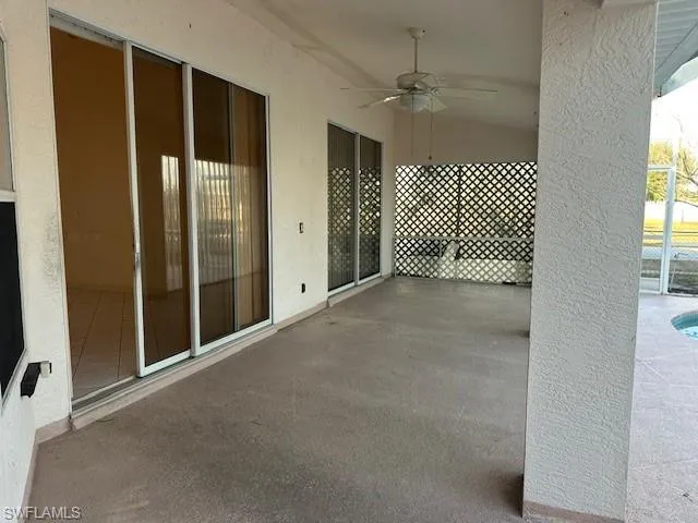 View of patio with ceiling fan
