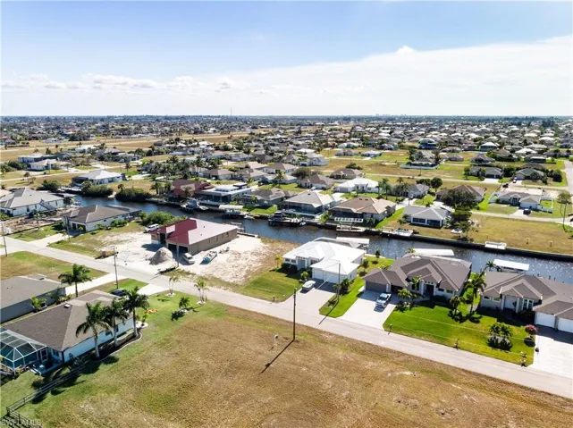 Aerial view of residential area with a nearby body of water