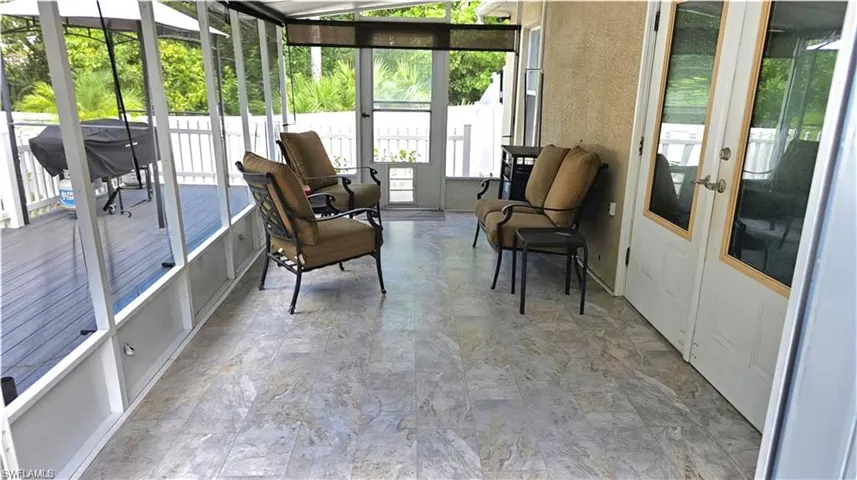 Sunroom / solarium with french doors