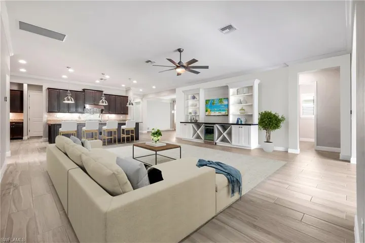 Photo includes reality renovation/ staging to showcase the possibility of the living room. Design services included with purchase!
