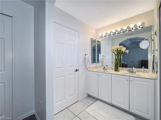 Door opens to shower/ toilet