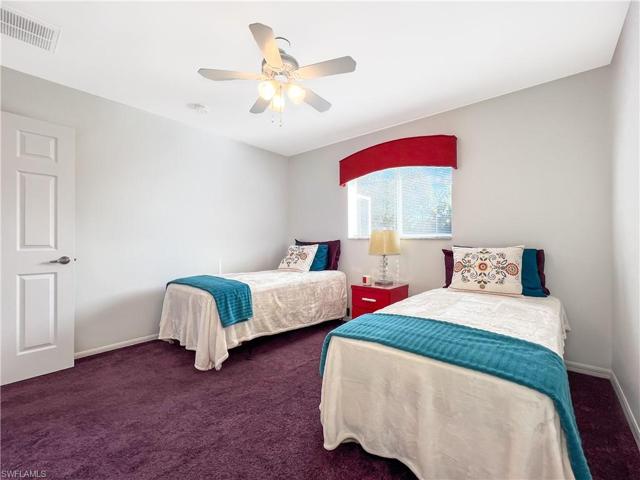 2 twin beds have plenty of room!  Window faces backyard