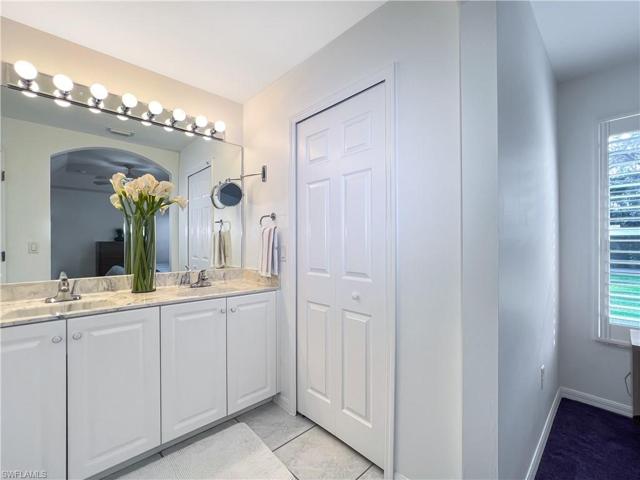 One of the 2 walk-in closets to the right of vanity