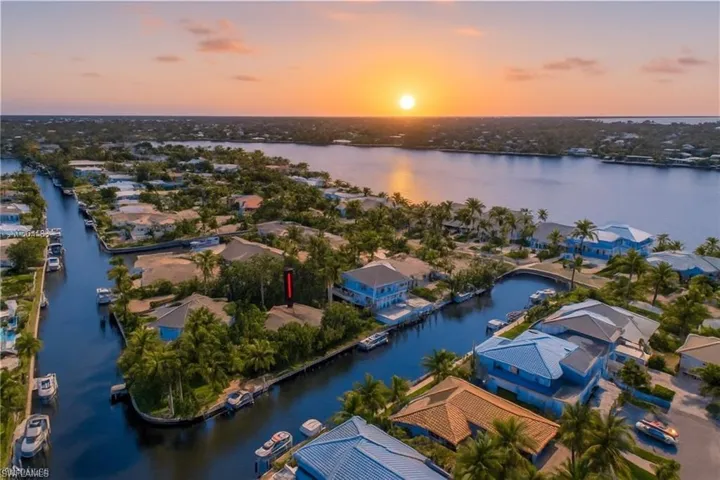 Aerial view of residential area with a nearby body of water