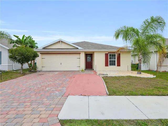 Front View of 731 Hadley Place W With Widened Driveway
