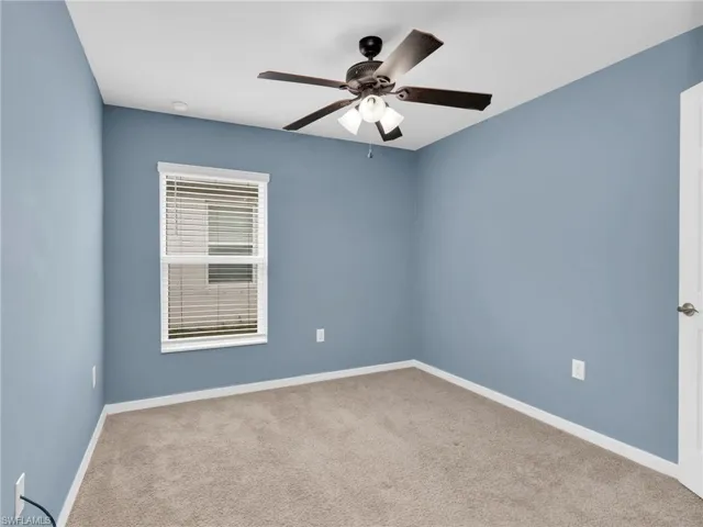 Bedroom 4 With Ceiling Fan and Faux Wood Blinds