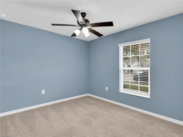 Bedroom 2 With Ceiling Fan and Faux Wood Blinds