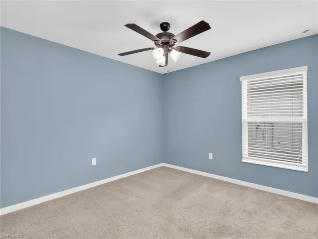 Bedroom 3 With Ceiling Fan And Faux Wood Blinds