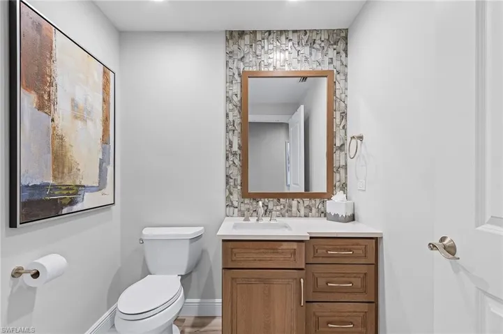 Bathroom with vanity and toilet