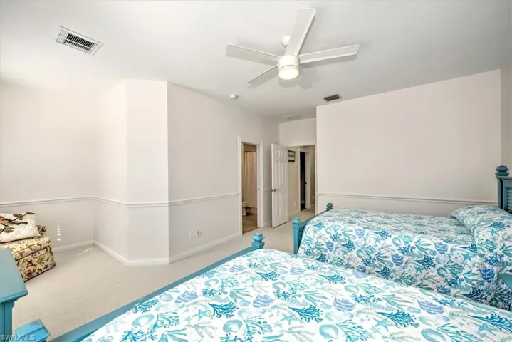 White walls with neutral carpeting