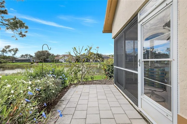 View of patio with a water view