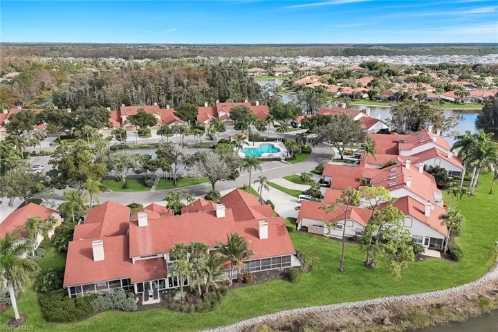 Aerial view of residential area with a nearby body of water