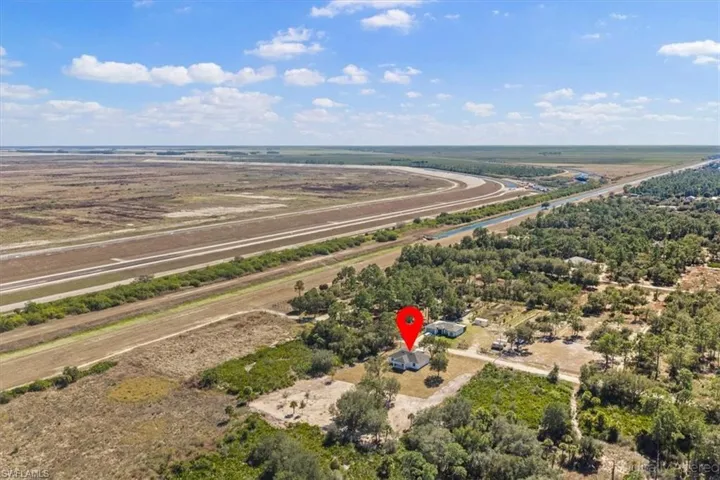 Aerial overview of property's location with rural landscape