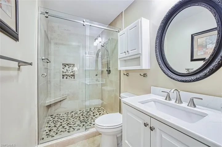 Master Bathroom featuring vanity and a shower stall