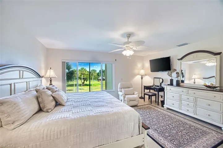 Master Bedroom featuring a ceiling fan and access to exterior