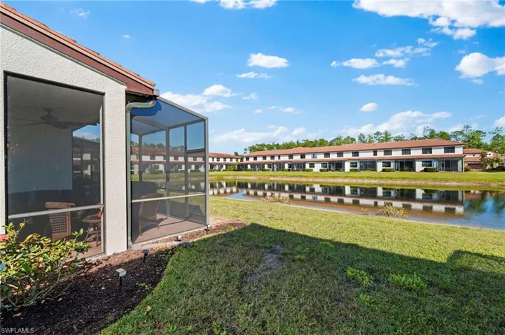 View of yard with a water view