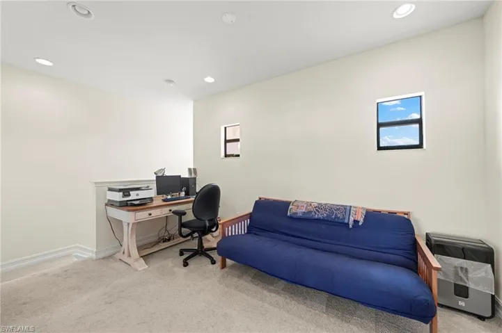 Home office with baseboards, carpet flooring, and recessed lighting