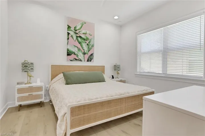 Primary Master Bedroom featuring light wood-style floors, recessed lighting, and a ceiling fan