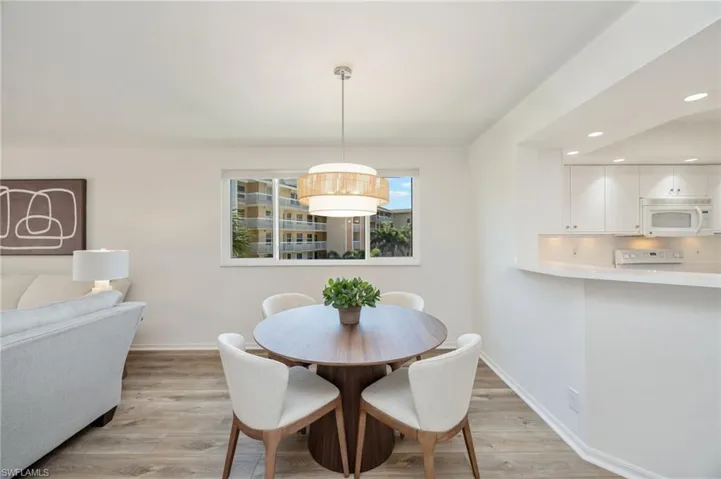 Dining room featuring recessed lighting and light wood-style flooring