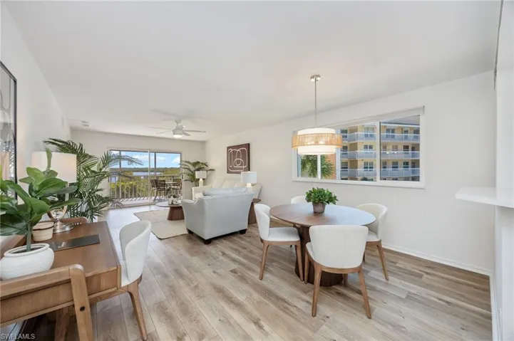 Dining room featuring light wood-style floors and ceiling fan