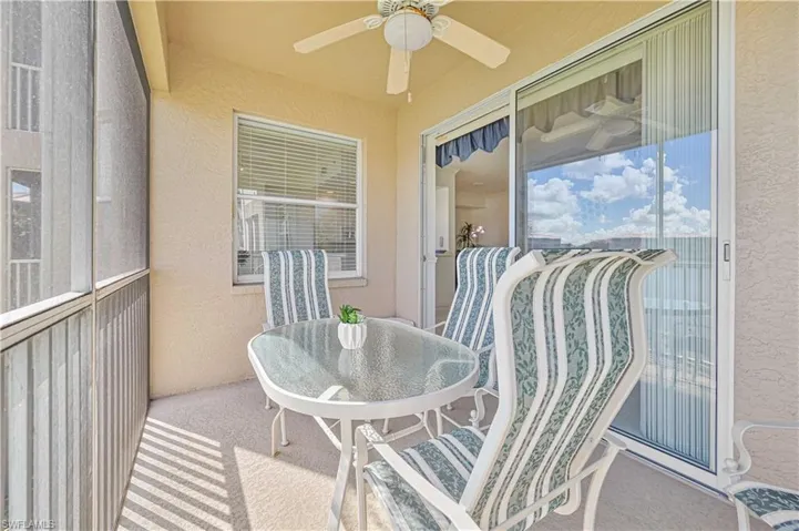 Balcony featuring ceiling fan and outdoor dining space