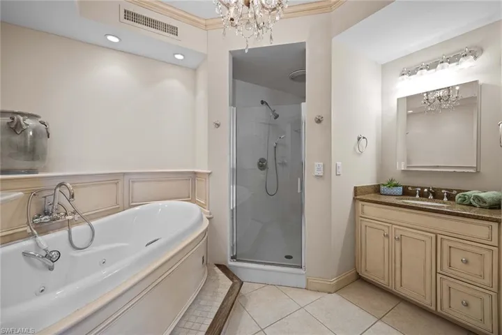 Granite Countertops, tile in master bathroom, Separate Tub & Shower